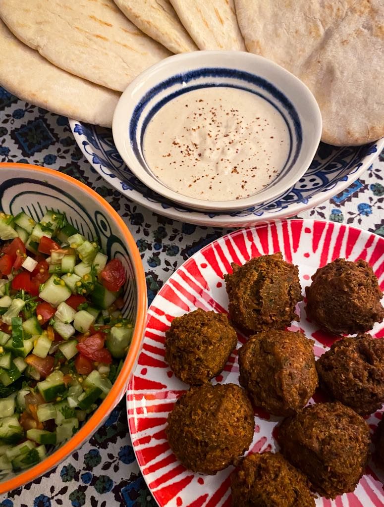 Falafel with warm pitta, tahini and Israeli salad